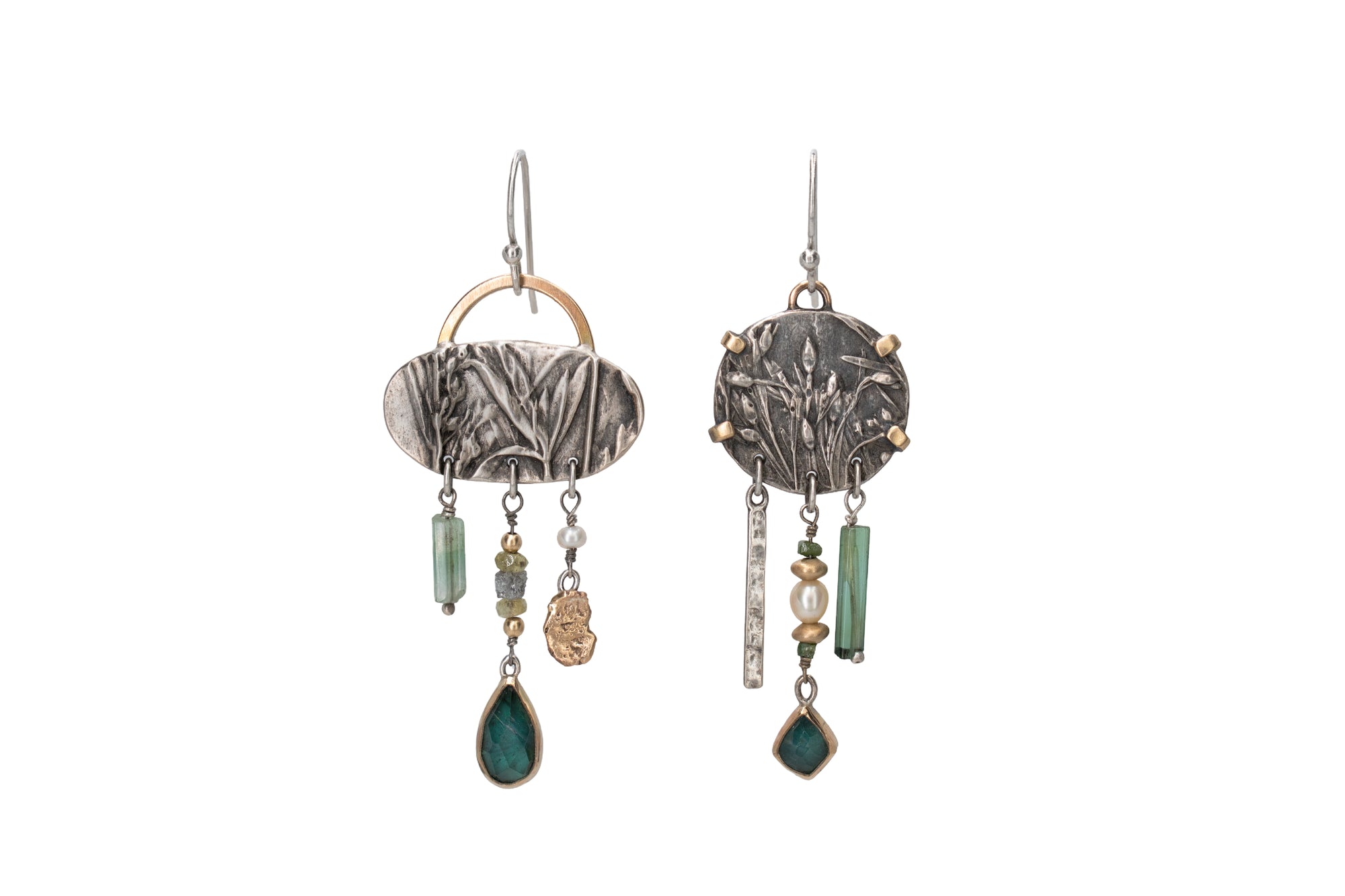 Asymmetrical sterling silver and 14k gold Wild Meadow Earrings with botanical textures and dangling green tourmaline, aquamarine, rough diamond and pearl details.