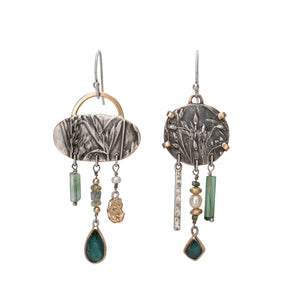 Asymmetrical sterling silver and 14k gold Wild Meadow Earrings with botanical textures and dangling green tourmaline, aquamarine, rough diamond and pearl details.