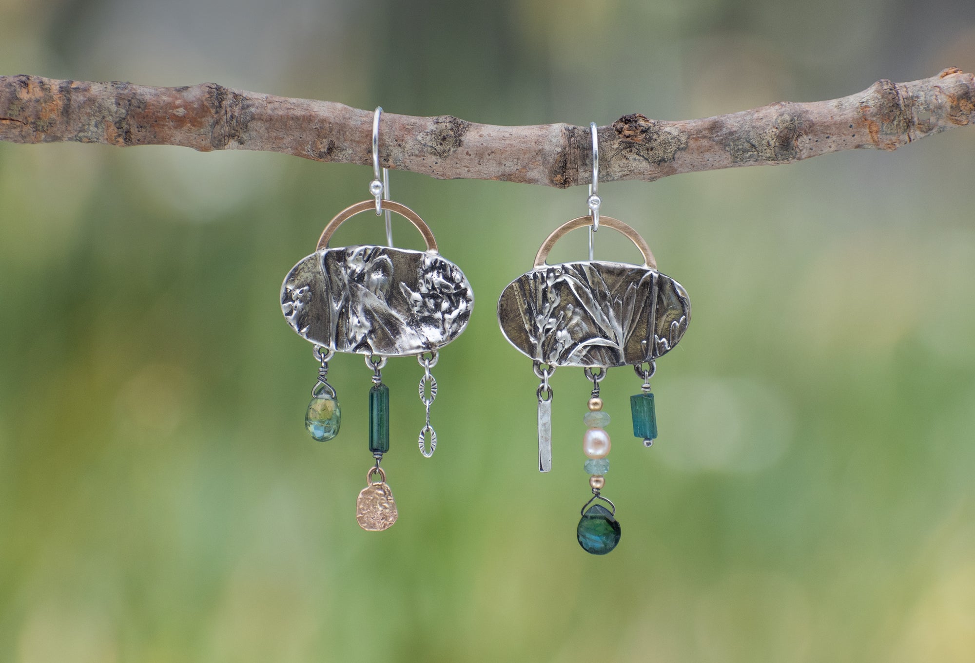 Oval Wild Meadow Earrings in sterling silver and 14k gold with botanical textures and dangling tourmaline, green garnet, aquamarine and freshwater pearl gemstones.