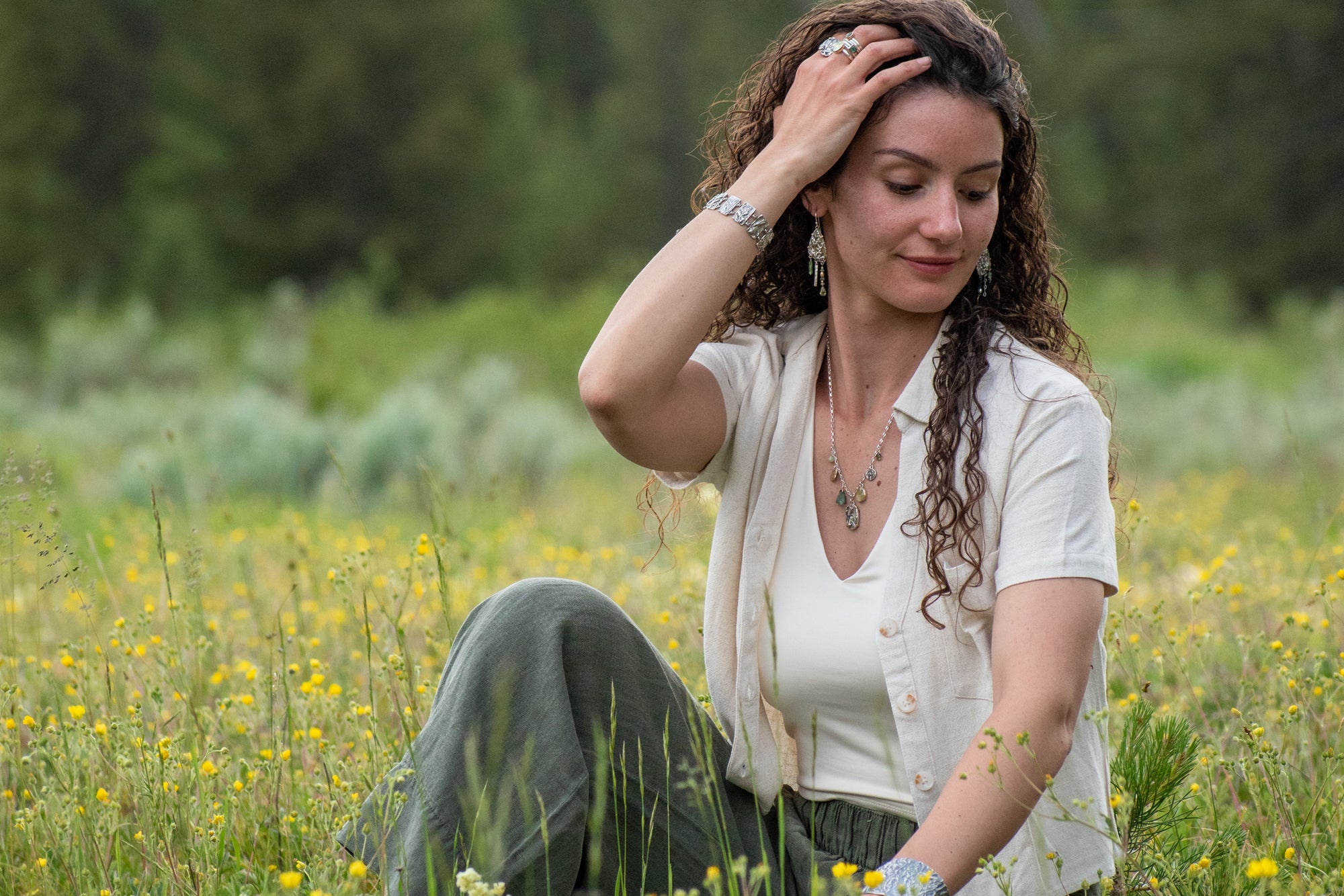 Wild Meadow Wing Earrings in sterling silver and 14k gold with lupine, goldenrod and sage botanical textures, dangling tourmaline, kyanite, aquamarine, green garnet, green diamond and freshwater pearl gemstones.