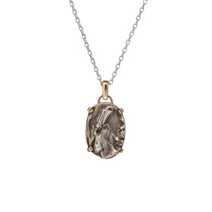 Nature-inspired Oval Wild Meadow Necklace in sterling silver and 14k gold with harebell bud and leaf botanical textures inspired by wildflowers and meadow plants.