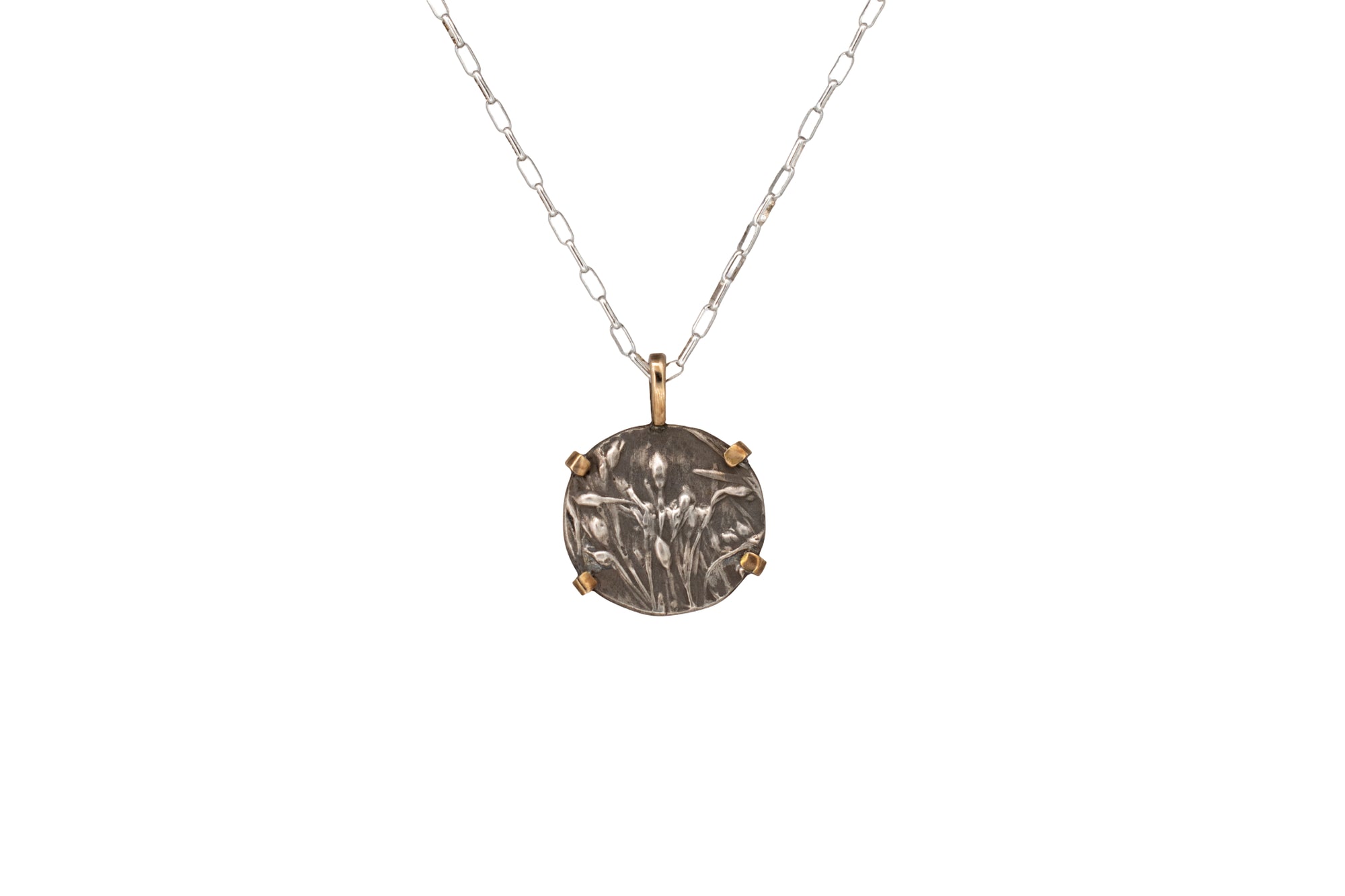 Nature-inspired Round Wild Meadow Necklace in oxidized sterling silver and 14k gold with wildflower and botanical textures from Spreading Groundsmoke stems, leaves and buds.
