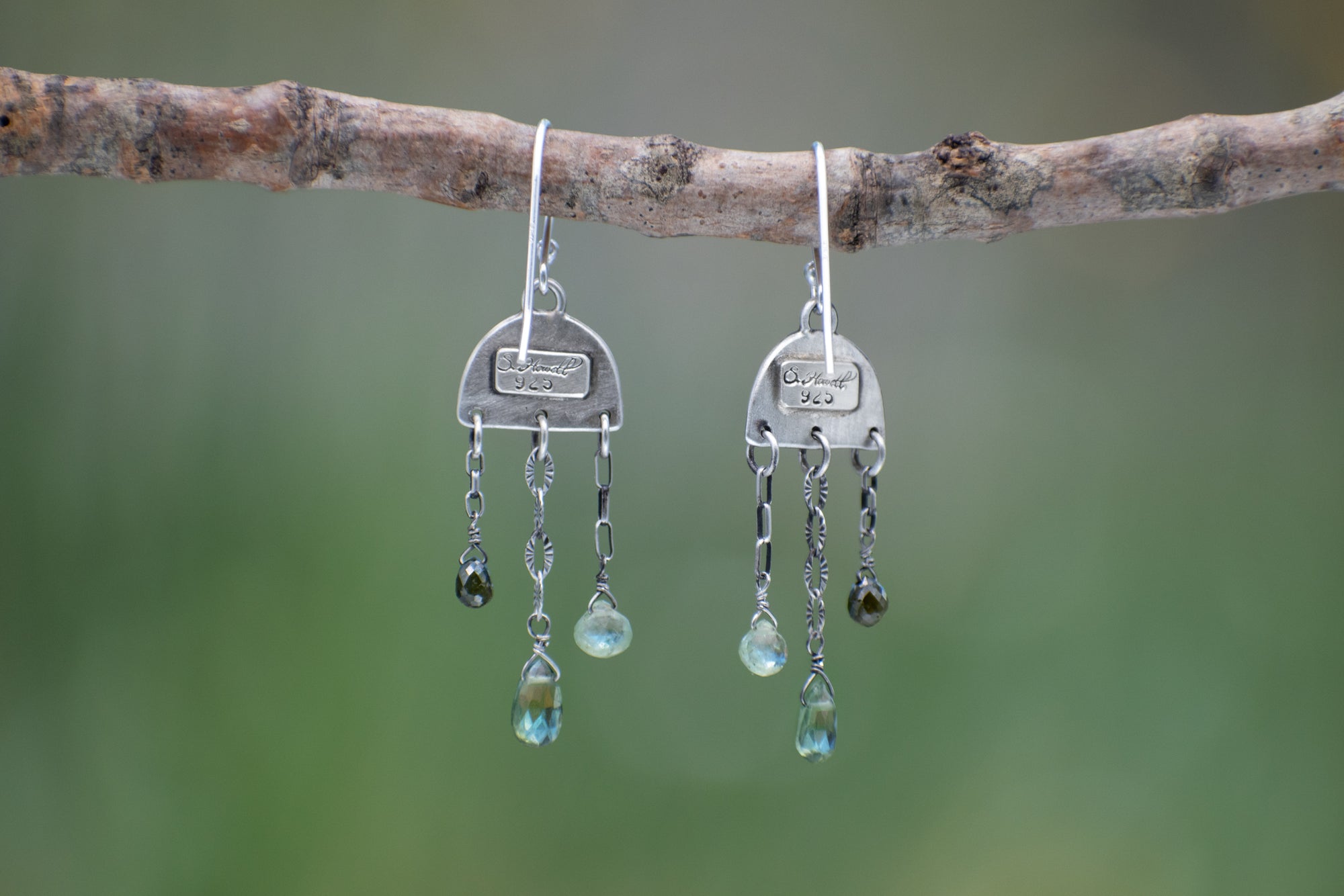 Wild Meadow Rain Earrings in sterling silver with late-summer sage botanical textures, dangling silver chains and green diamond, kyanite and green garnet gemstones.