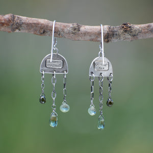 Wild Meadow Rain Earrings in sterling silver with late-summer sage botanical textures, dangling silver chains and green diamond, kyanite and green garnet gemstones.