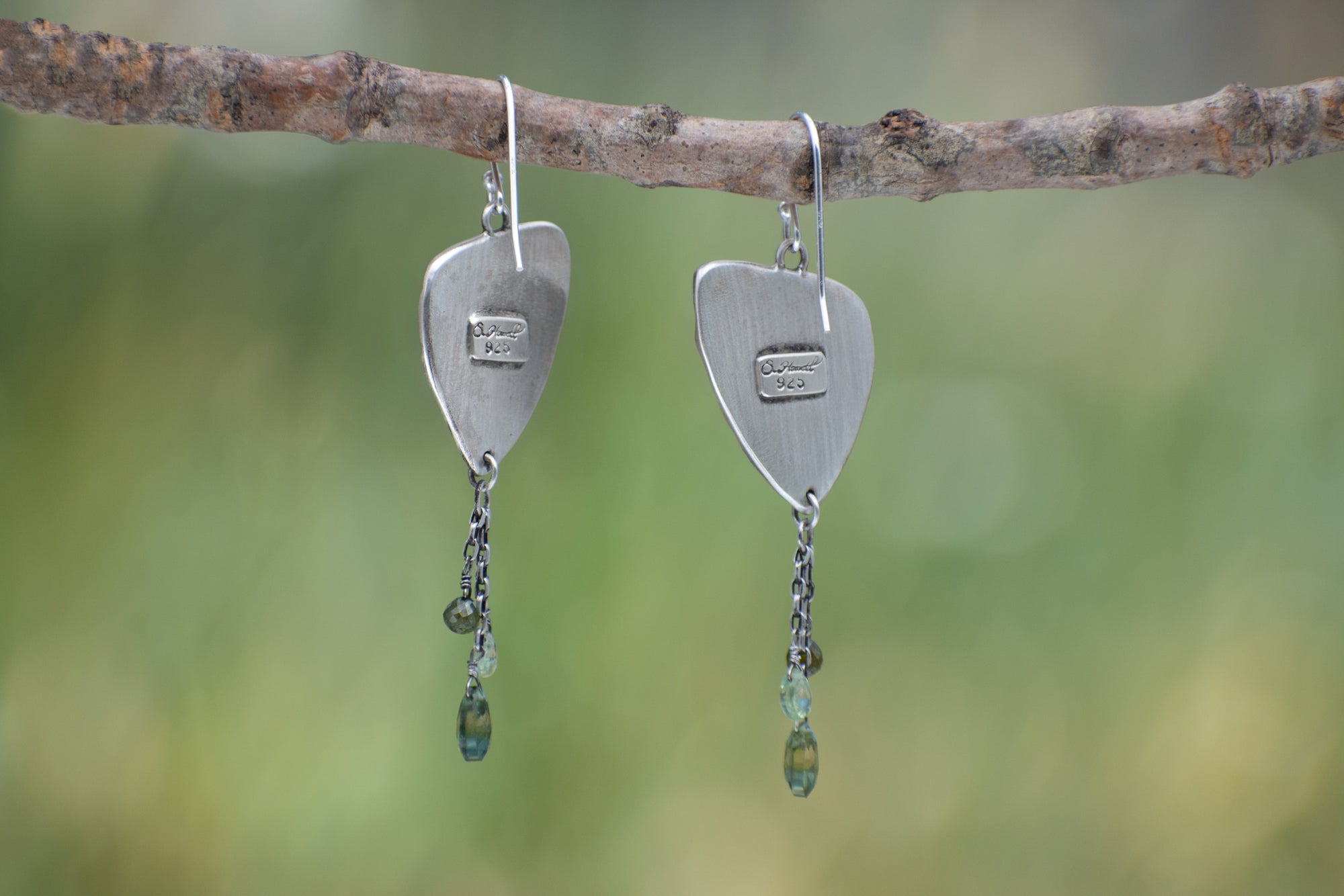 Wild Meadow Triangle Earrings in sterling silver with sagebrush, goldenrod, lupine and wild grass botanical textures, dangling silver chains and green diamond, kyanite and green garnet gemstones.