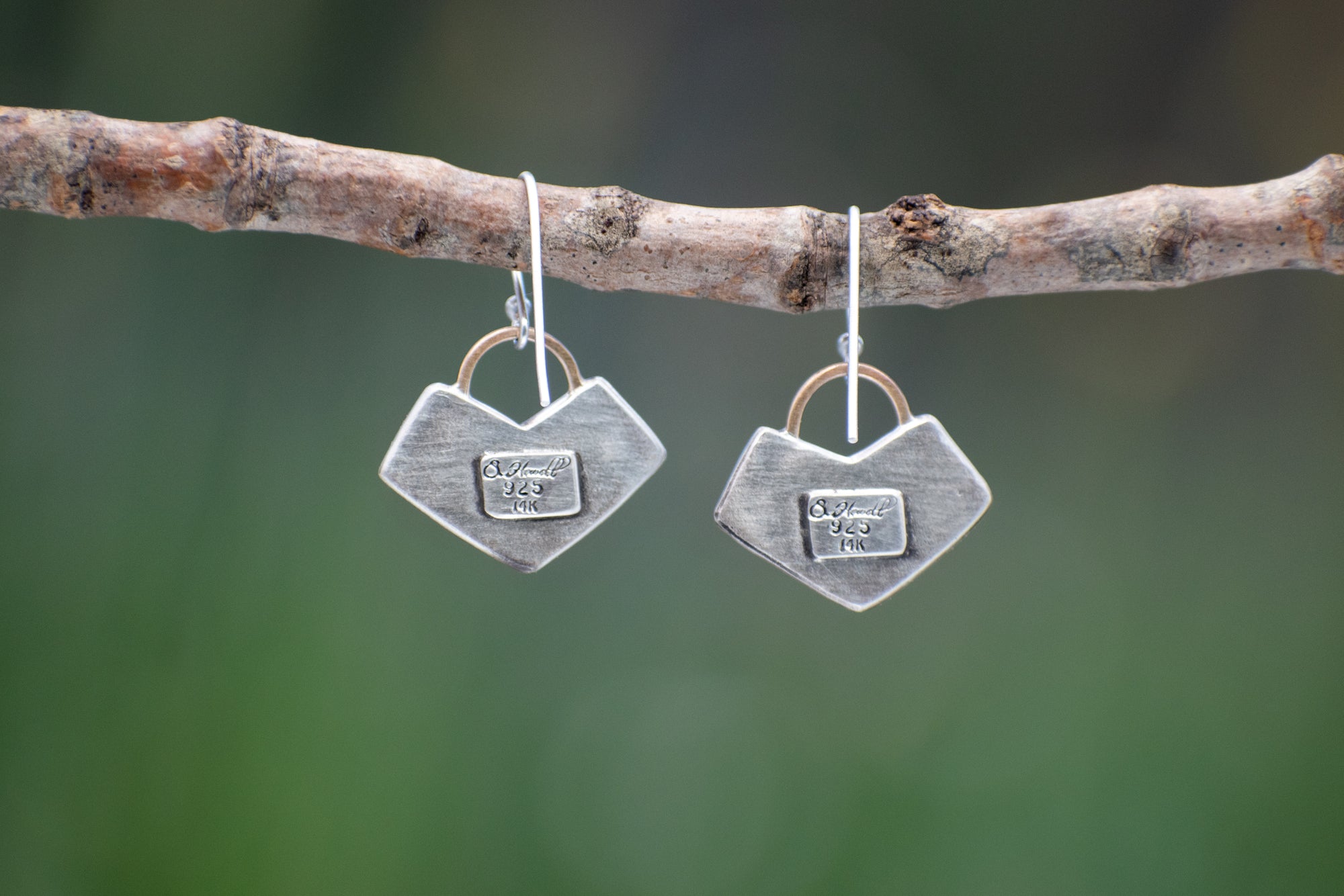 Nature-inspired sterling silver Wild Meadow Earrings with wildflower and botanical textures from Spreading Groundsmoke and goldenrod, accented with 14k gold setting-sun arcs.