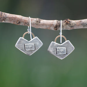 Nature-inspired sterling silver Wild Meadow Earrings with wildflower and botanical textures from Spreading Groundsmoke and goldenrod, accented with 14k gold setting-sun arcs.