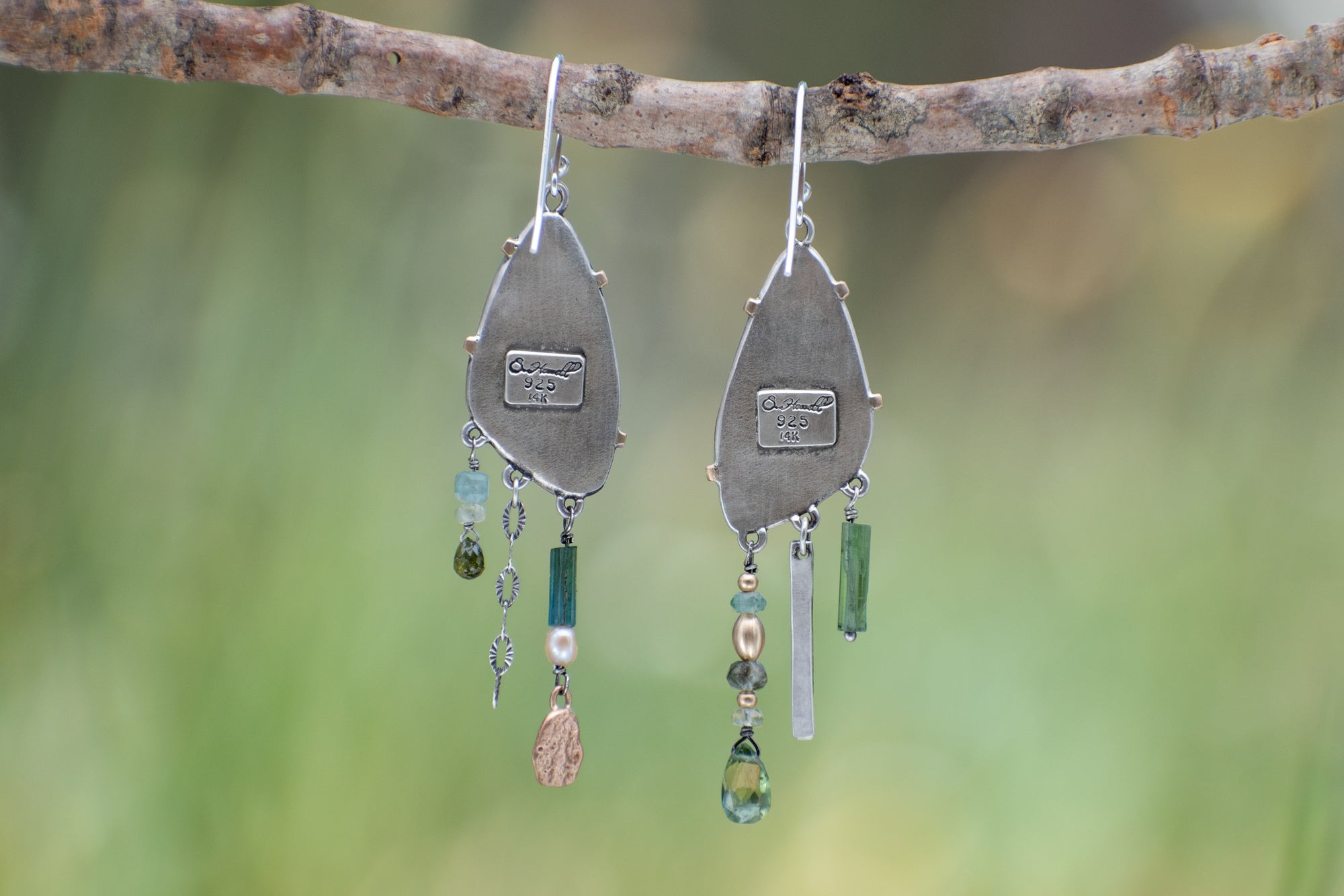 Wild Meadow Wing Earrings in sterling silver and 14k gold with lupine, goldenrod and sage botanical textures, dangling tourmaline, kyanite, aquamarine, green garnet, green diamond and freshwater pearl gemstones.