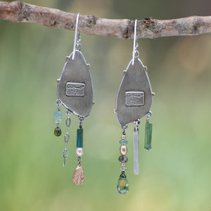 Wild Meadow Wing Earrings in sterling silver and 14k gold with lupine, goldenrod and sage botanical textures, dangling tourmaline, kyanite, aquamarine, green garnet, green diamond and freshwater pearl gemstones.